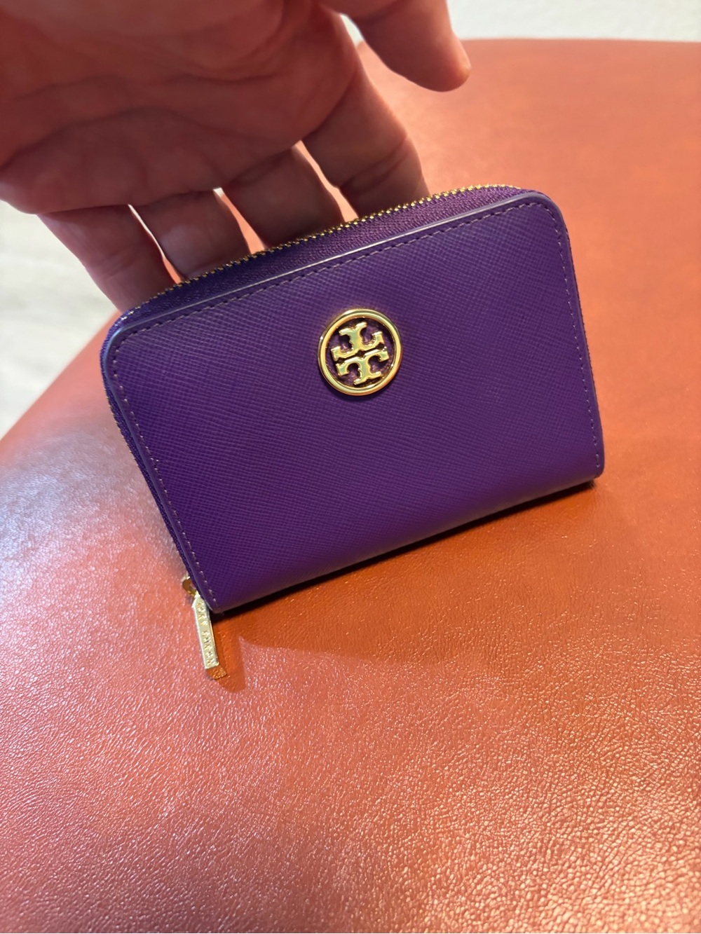 Tory Burch Robinson Saffiano zip-around wallet in a vibrant violet purple New
